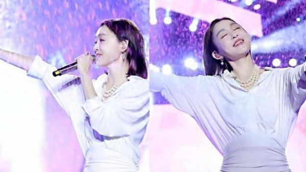 安福相册 范玮琪暴雨中开唱全身湿透，演唱无碍获网友大赞敬业！